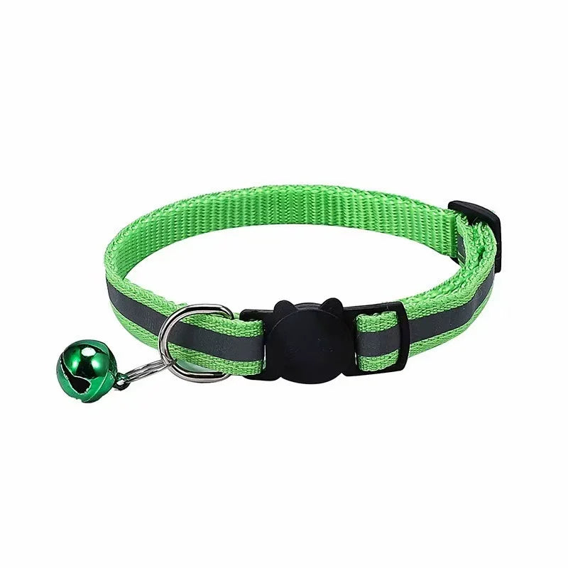 A bright green reflective pet collar with a black adjustable head buckle and a green tag.