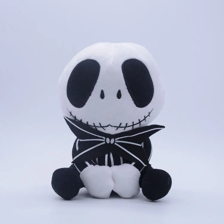 A white and black cartoon skeleton dog plush toy with stitched features and a black collar.