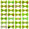 A collection of adorable pet hair bows in various colors and patterns with gentle rubber bands.