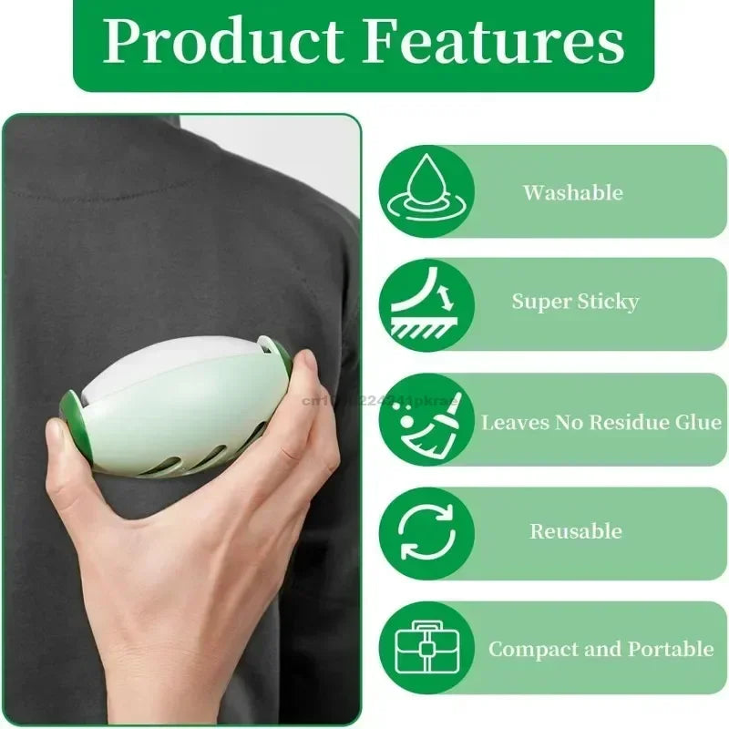 A hand holds a light green silicone roller for pet hair removal against a dark gray fabric background.