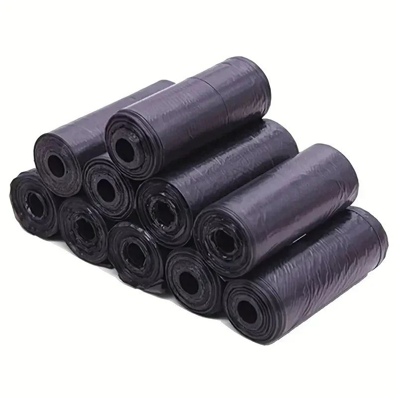 A stack of black biodegradable dog poop bags with an easy-tear design.