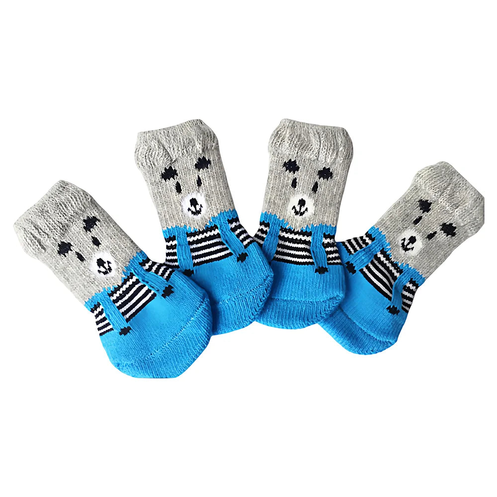 A pack of four anti-scratch cotton pet socks for small dogs and cats featuring gray and blue stripes.