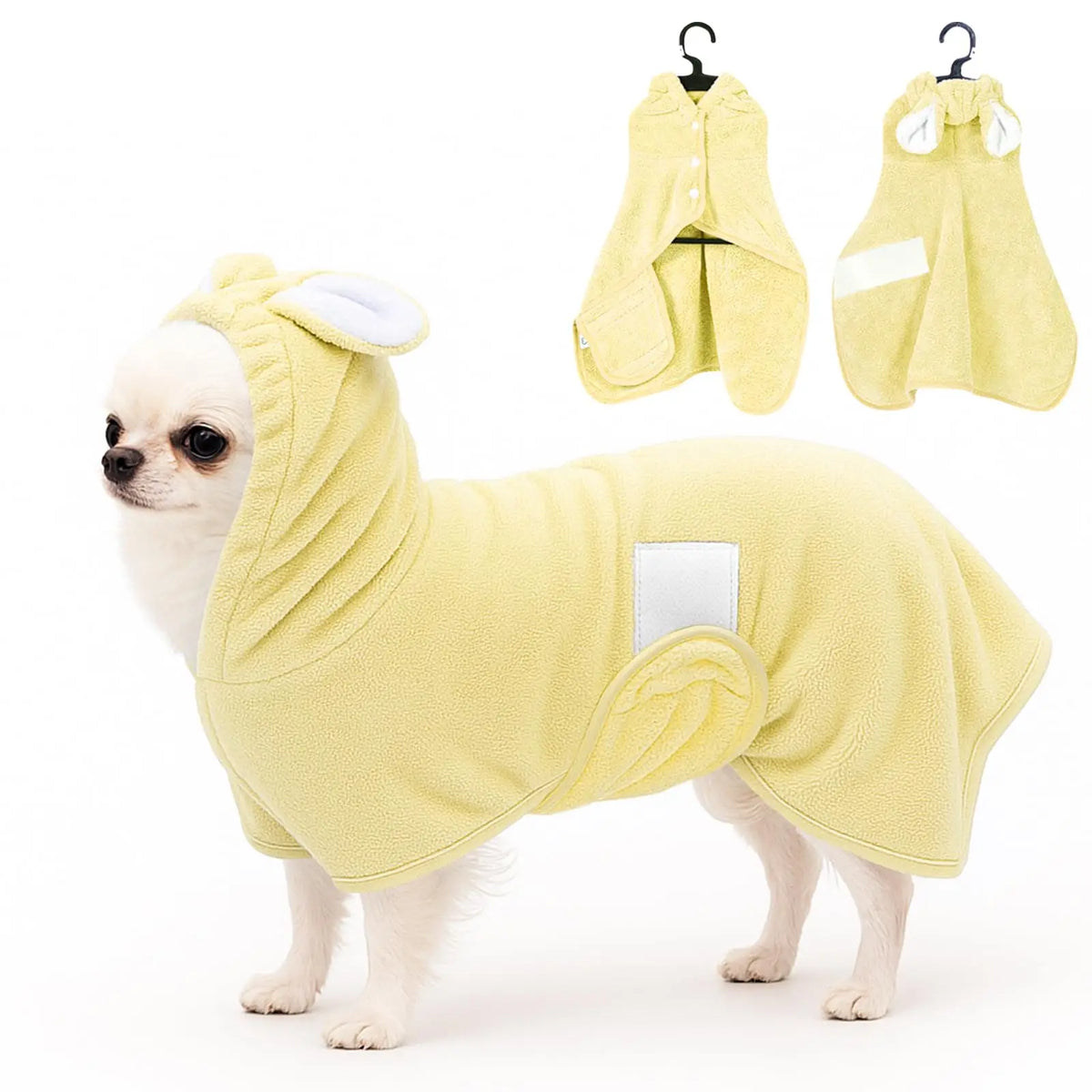 A light yellow hooded pet bathrobe towel for dogs and cats displayed next to a small white dog.