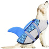 A light-colored dog wearing a blue and gray swimming life jacket designed for medium to large breeds.