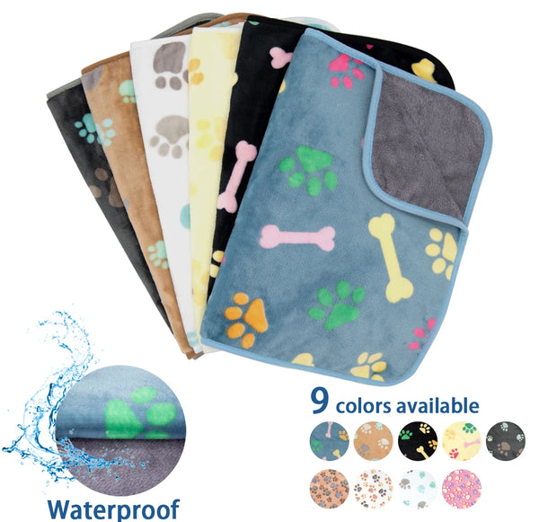 A collection of nine waterproof dog blankets in various colors and patterns shown together.