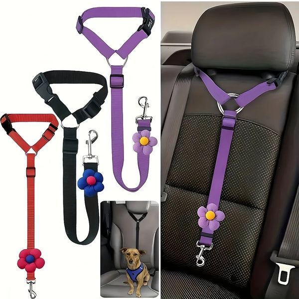 Purple and black vehicle seat belt tether for dogs with a flower charm