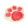 A natural loofah cat chew toy shaped like a paw print with red catnip inside.
