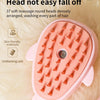 A pink integrated brush with round heads is shown on a white fluffy surface.