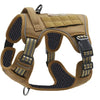 A tan tactical dog harness with black and gold webbing and padded sections.