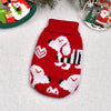 A knitted red dog sweater with white patterns is displayed on a white background.