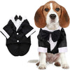 A dog wearing a black tuxedo bow tie outfit with white accents.