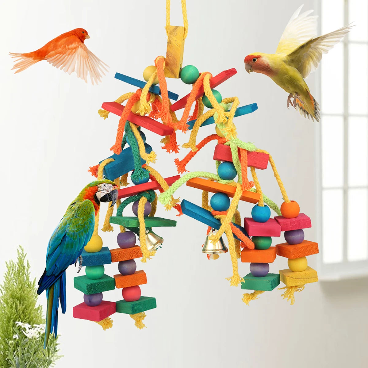 Colorful wooden bead chew toys for parrots hanging from a hook, featuring various bright colors and shapes.