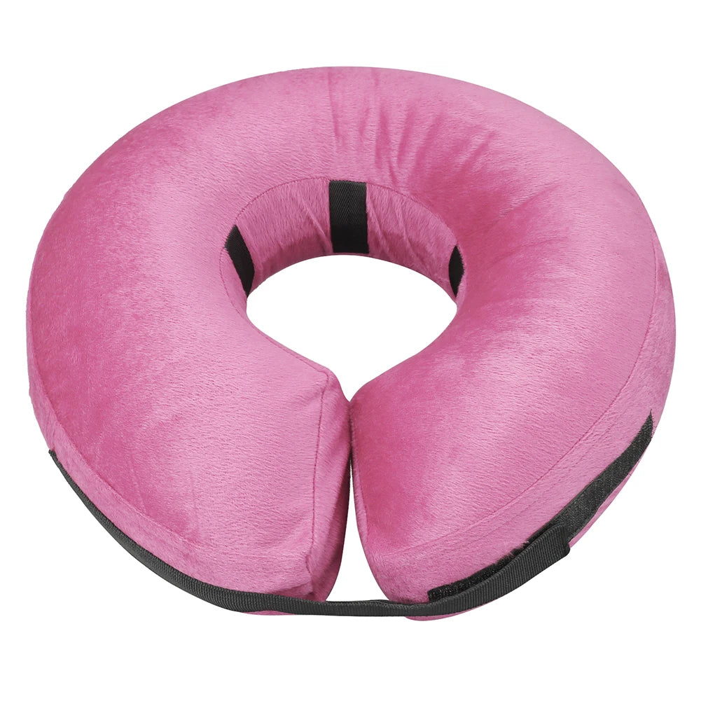 A pink inflatable pet recovery collar designed for dogs and cats.