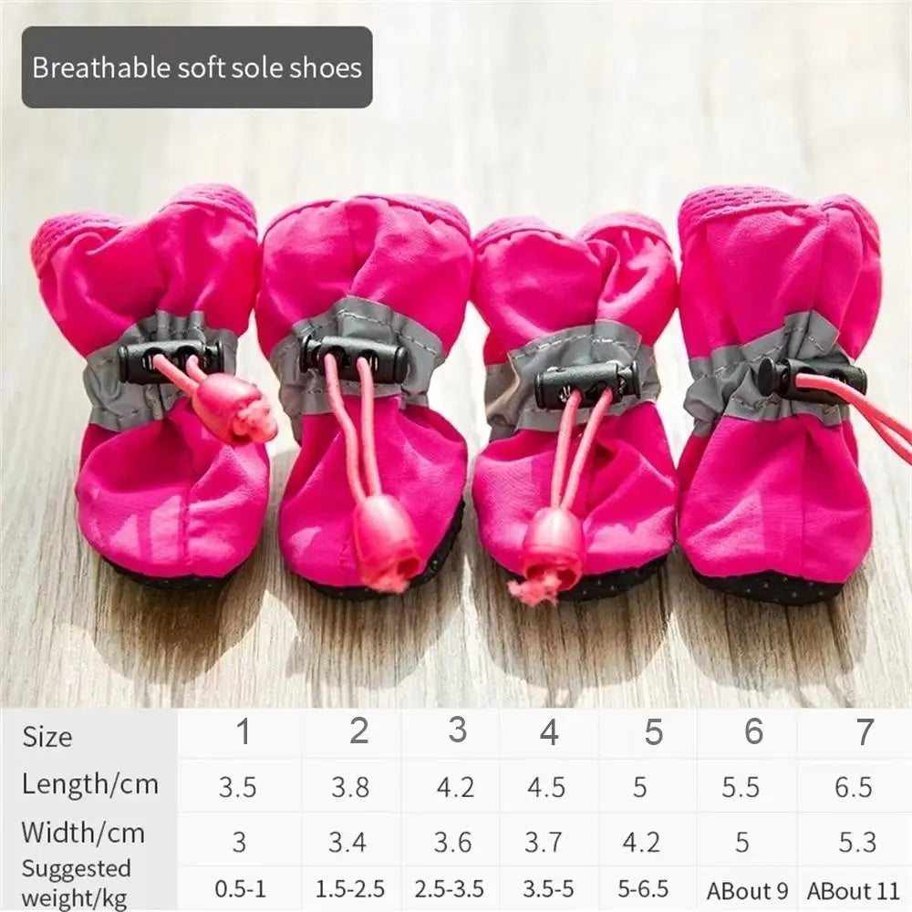 A set of bright pink breathable soft sole shoes for dogs with adjustable straps