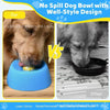 A blue silicone dog bowl with a well-style design being used by a dog.
