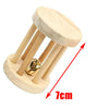 A natural wooden chew toy with a light wood handle and brass tip, shown at an angle.