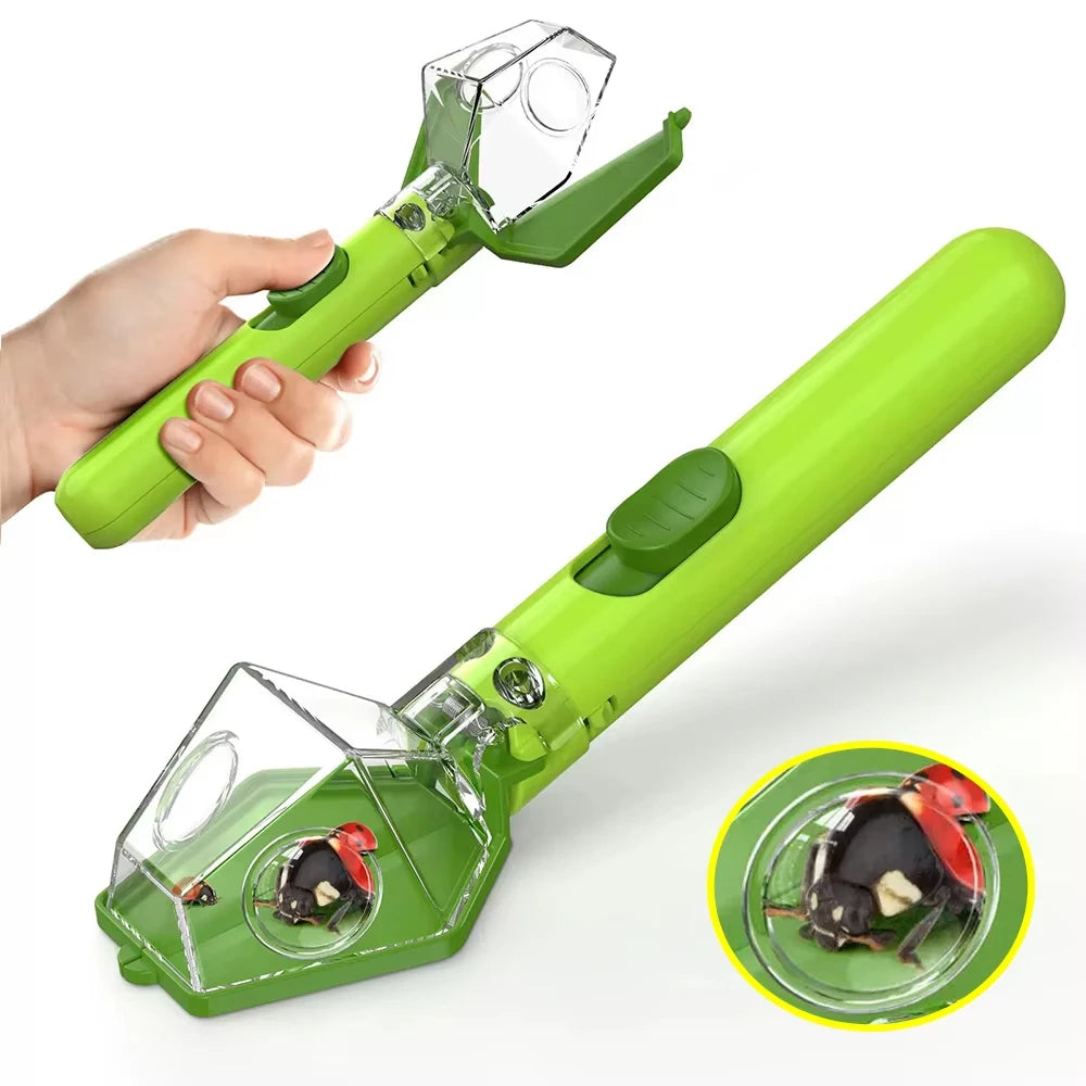 A hand holds a bright green portable handheld insect catcher with a clear plastic collection chamber.