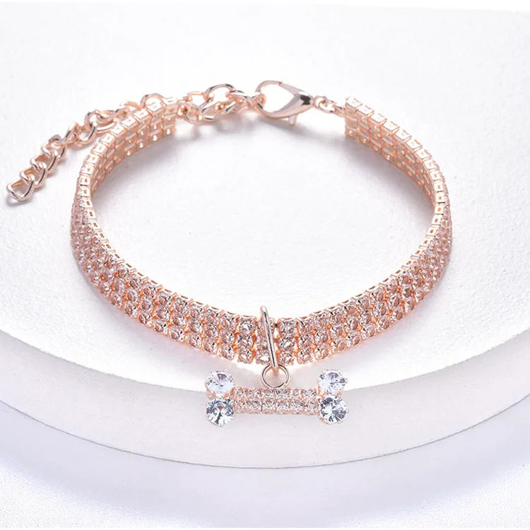 Rose gold crystal rhinestone pet collar with a bone pendant