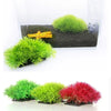 Vibrant artificial green and red aquatic plants used for fish tank decoration