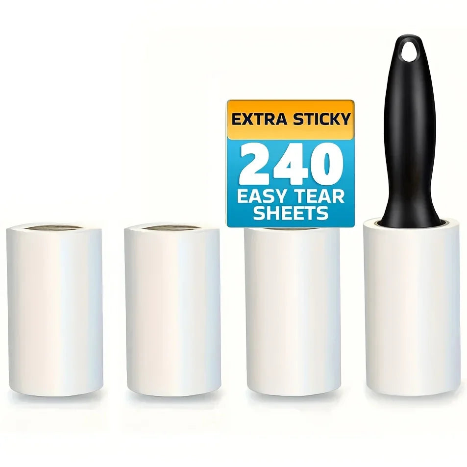 A set of four white lint roller sheets and one black roller with an extra sticky label.