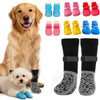 A collection of waterproof anti-slip dog socks in various colors and styles for dogs.
