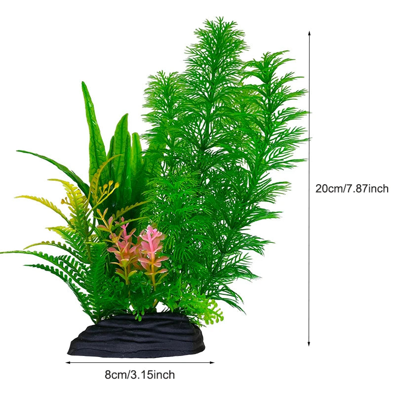 Composition d'une plante aquatique artificielle verte avec des accents roses et jaunes, dans un pot noir.