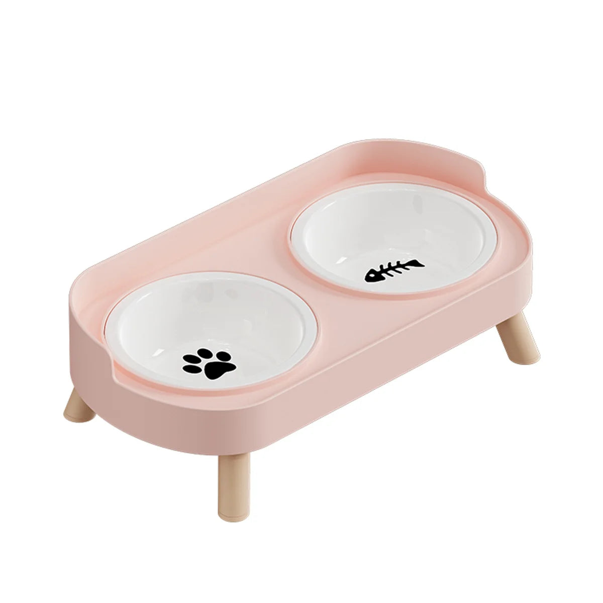 A pink stainless steel double bowl for dogs and cats with two white bowls.