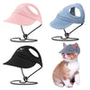 Four adjustable pet baseball caps in pink, blue, black, and gray shown with a cat.