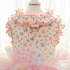 A pink floral princess pet dress for dogs and cats displayed on a white mannequin.