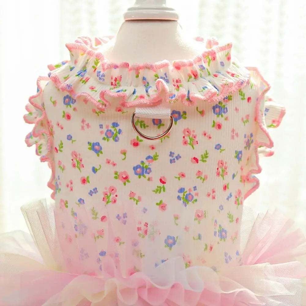 A pink floral princess pet dress for dogs and cats displayed on a white mannequin.
