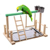 A multi-level bird activity center made of wood with a green perch and a hammock for a parrot.