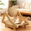 A fluffy orange and white cat is relaxing on a wooden scratching post toy.