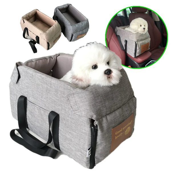 A gray portable pet carrier with a handle, showing a white dog inside and separate carriers.