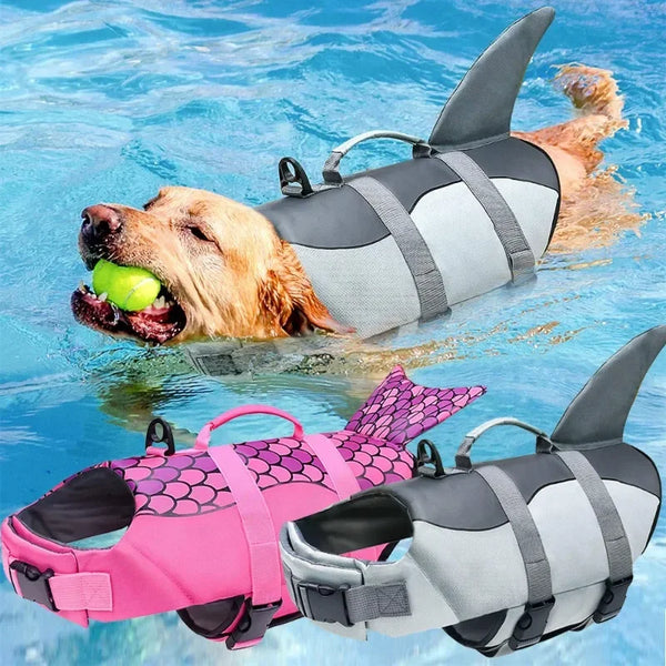 A golden retriever is swimming in the water wearing a gray and white dog life jacket.
