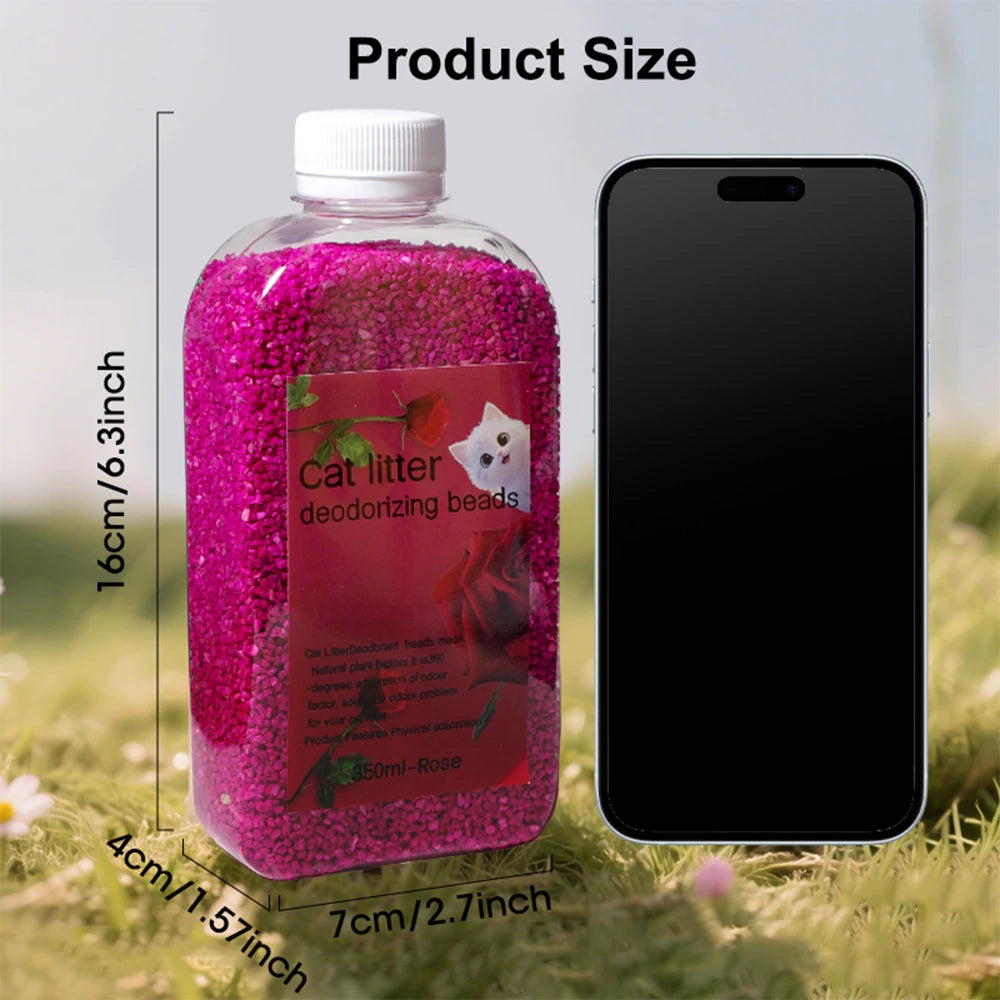 A bottle of pink cat litter deodorizing beads next to a smartphone, showing the product size.