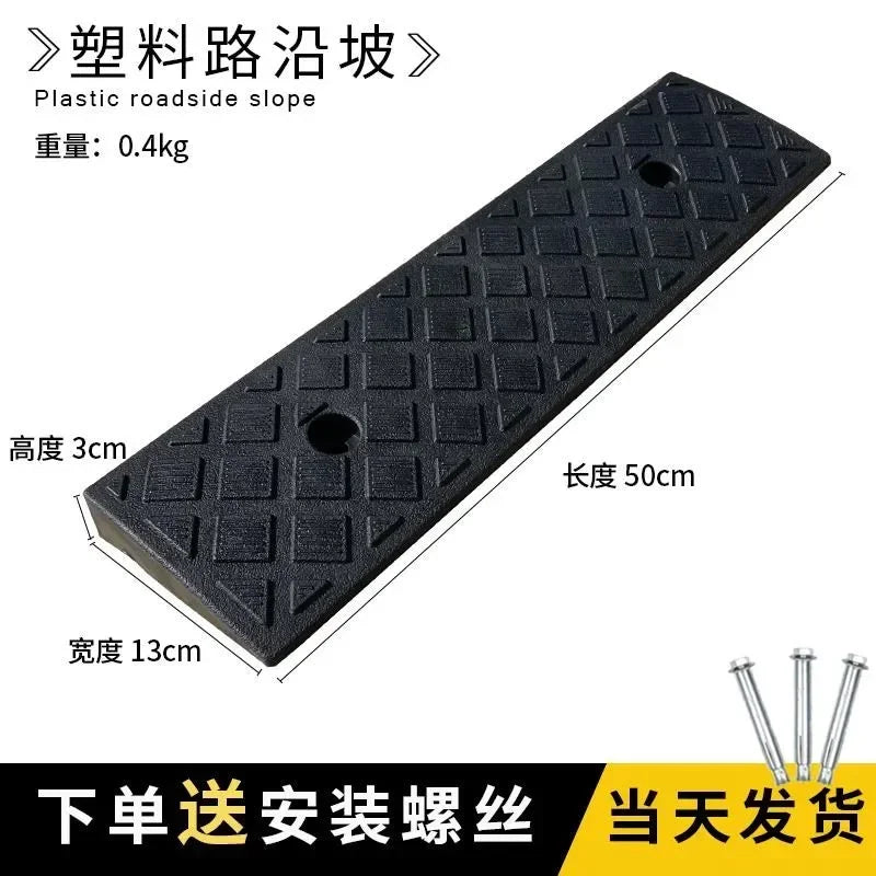 Black plastic roadside slope ramp measuring 50cm long and 3cm high