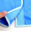 A close-up of a light blue breathable dog cooling vest with quick-dry fabric showing the stitching and texture.