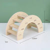 A natural wooden hamster house and activity platform with a curved design, shown on a white surface.