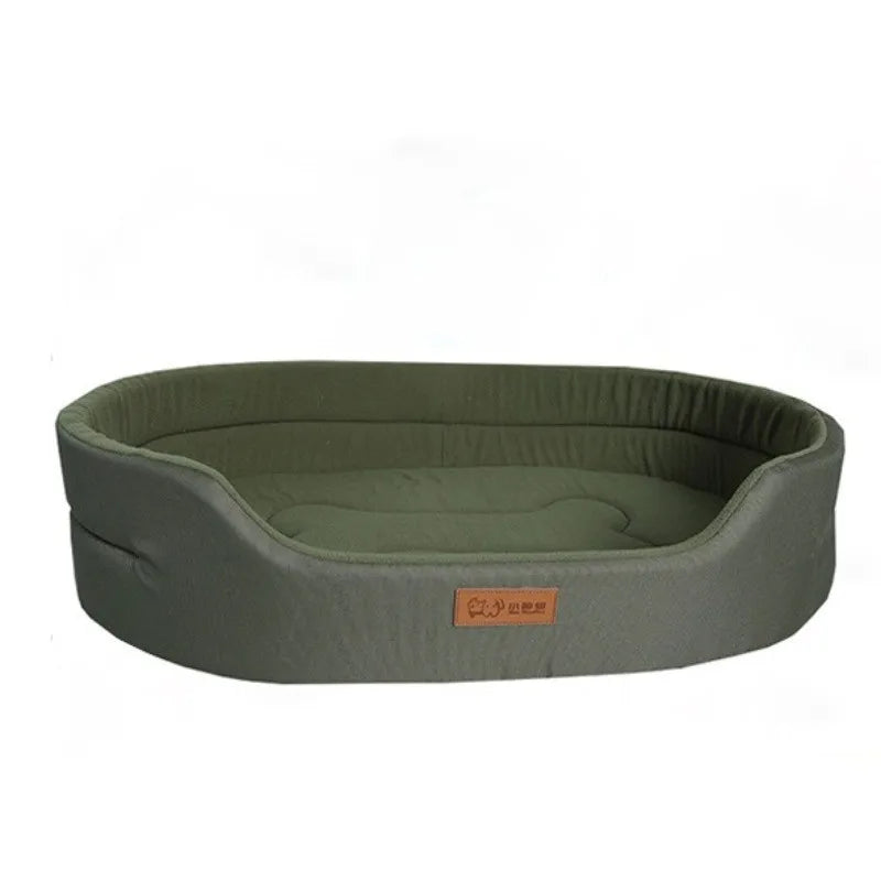 A rectangular, olive green washable waterproof dog bed mat with a padded interior.