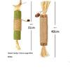 Two natural wooden teething sticks for cats, one green and one tan, shown vertically.
