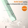 A light green pet grooming tool with a removable knife head being washed in water.