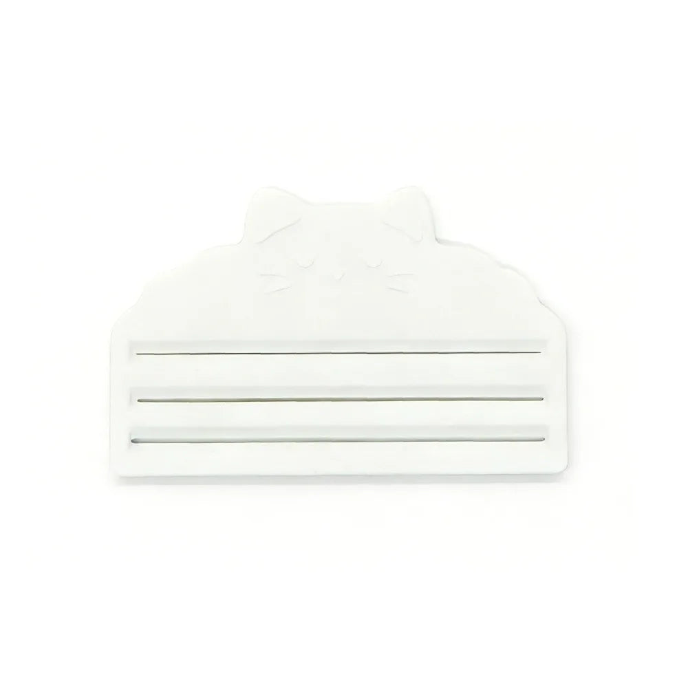 White reusable cat food pouch scraper with a cat face design