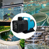 A black and blue submersible water pump is shown in a close-up view with a background of an aquarium and a small waterfall.