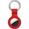 Red silicone protective cover for an AirTag with a metal keychain ring.