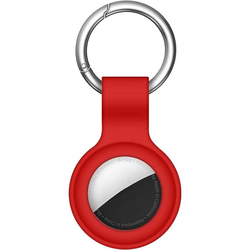 Red silicone protective cover for an AirTag with a metal keychain ring.