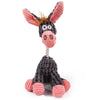 Juguete de peluche con forma de cabeza de caballo, orejas rosas y cuerpo gris, usado como juguete masticable para los dientes