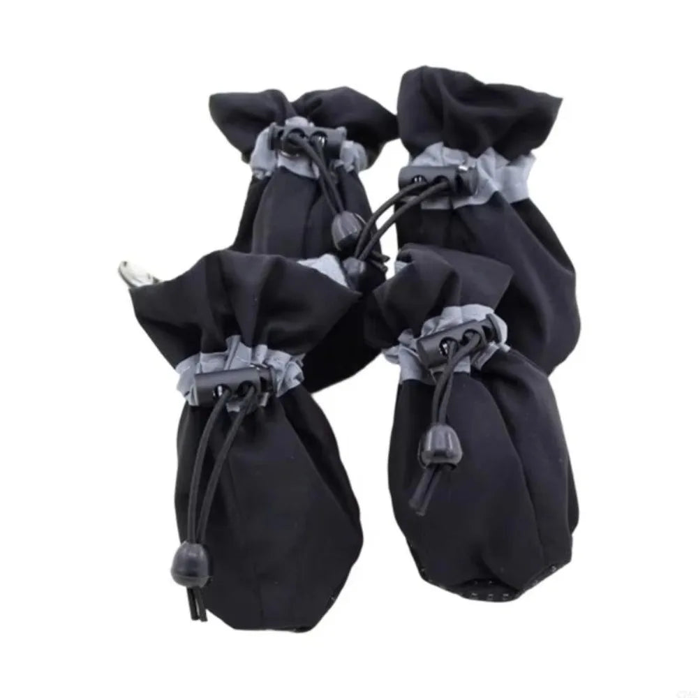 A pair of black cozy anti-slip dog booties with reflective grip