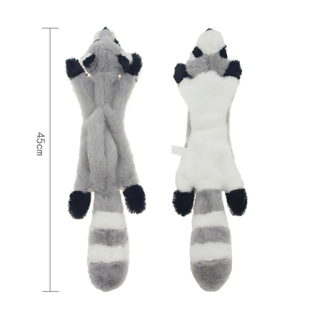 A pair of gray and white plush dog toys with black accents shown against a white background.