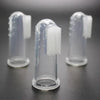 Clear silicone finger toothbrush for dogs with bristles shown in a row