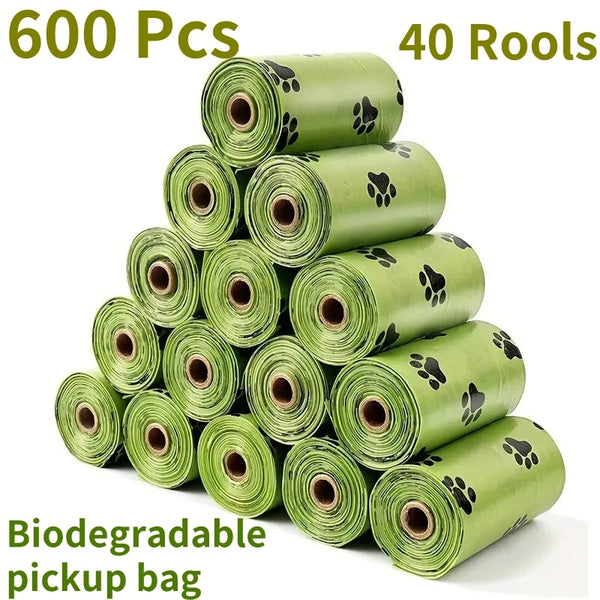 A stack of 40 rolls of biodegradable poop bags in a light green color.
